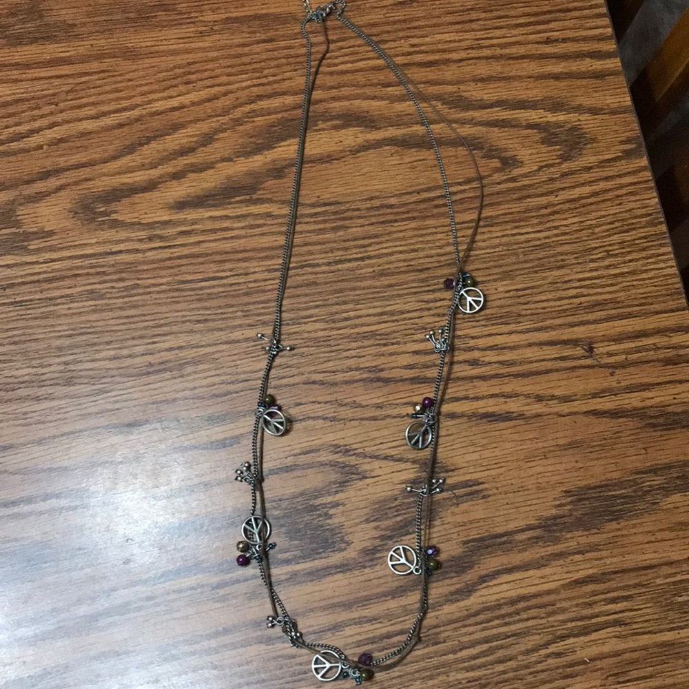ADORABLE long peace sign necklace.